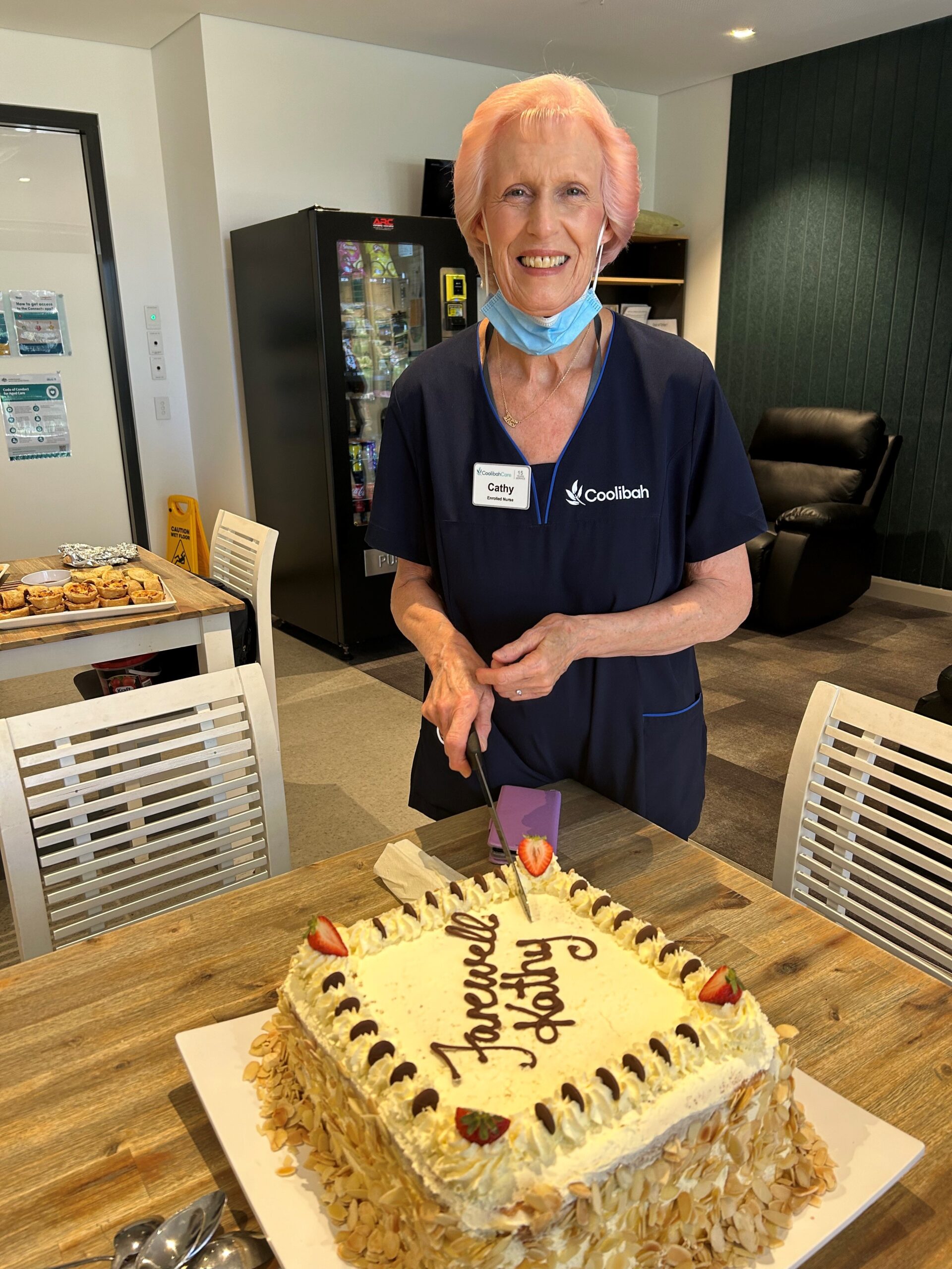 You are ACE - Cathy Buick cuts her retirement cake